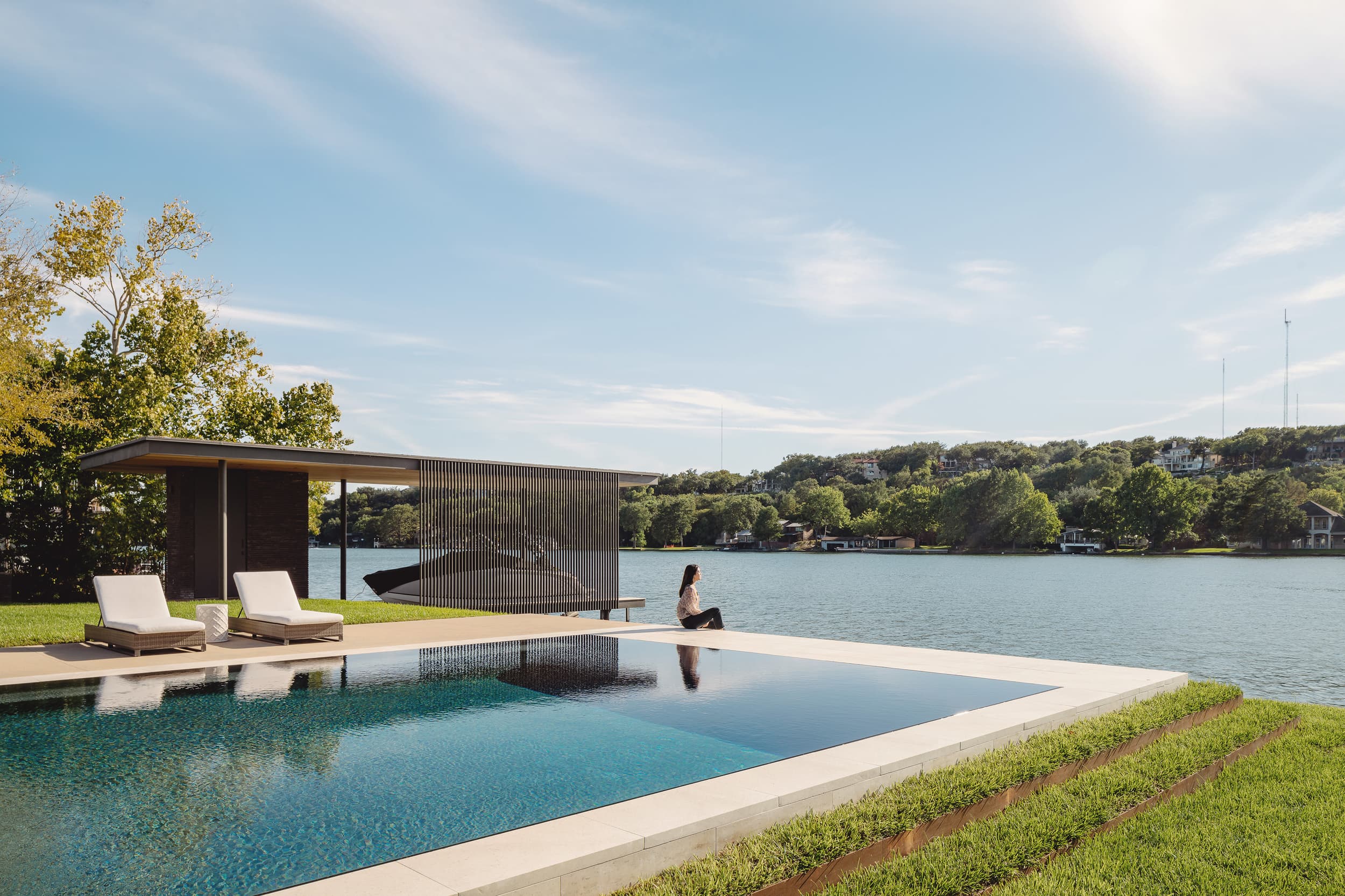 Water's Edge Residence - Pool with lake in background; A Parallel Architecture