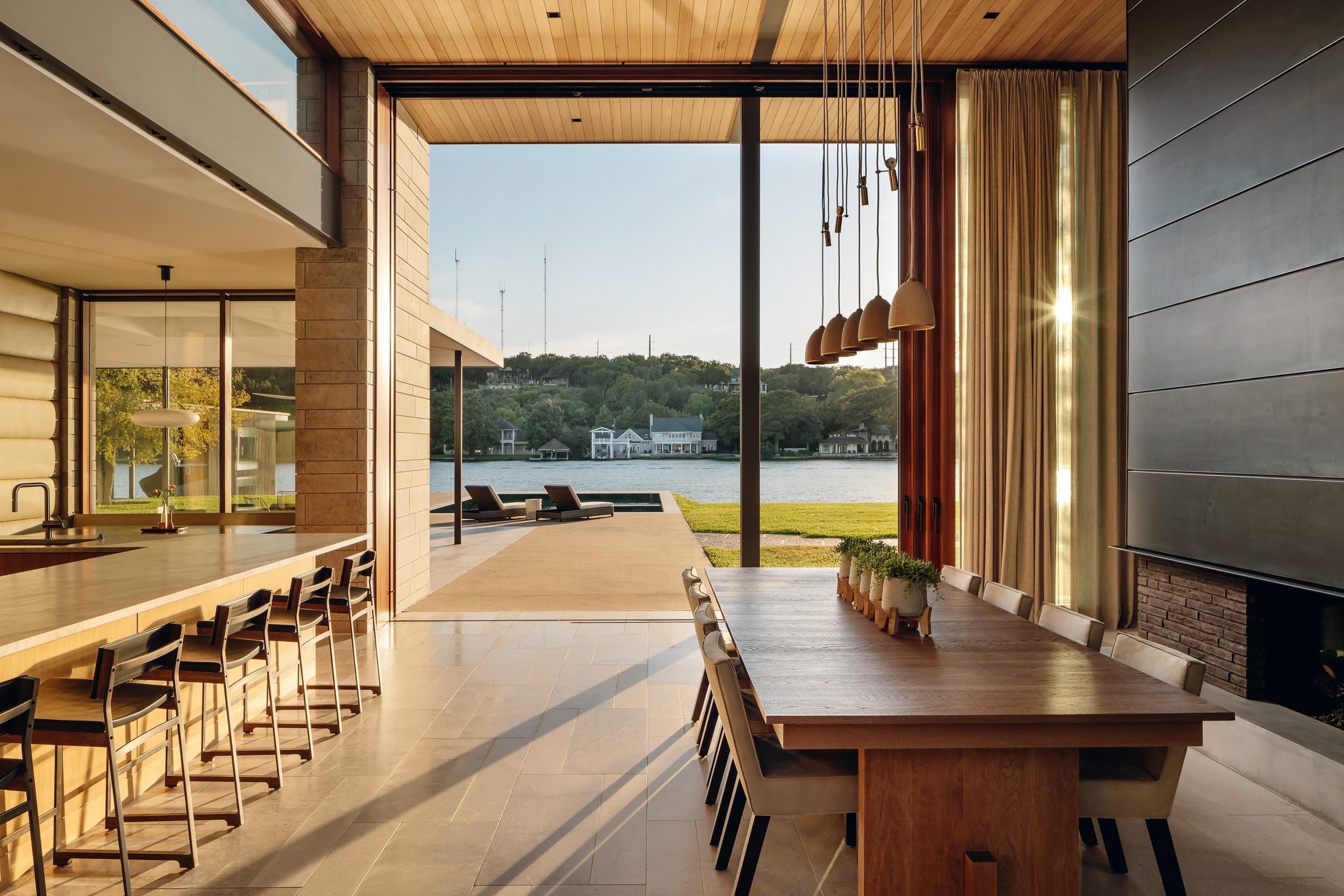 Water's Edge Residence - Dining room to water view; A Parallel Architecture