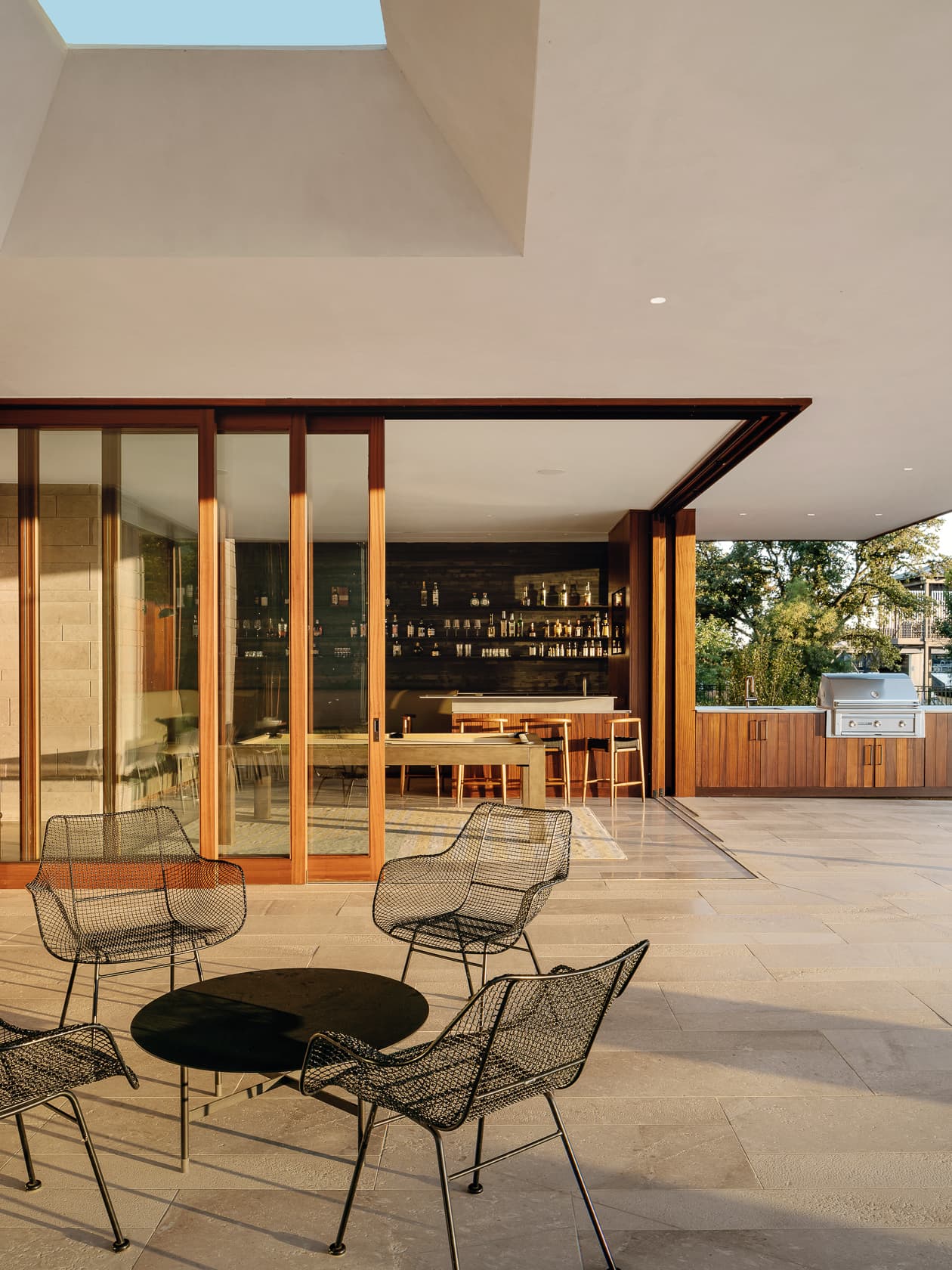Water's Edge Residence - Outdoor patio towards Bar; A Parallel Architecture