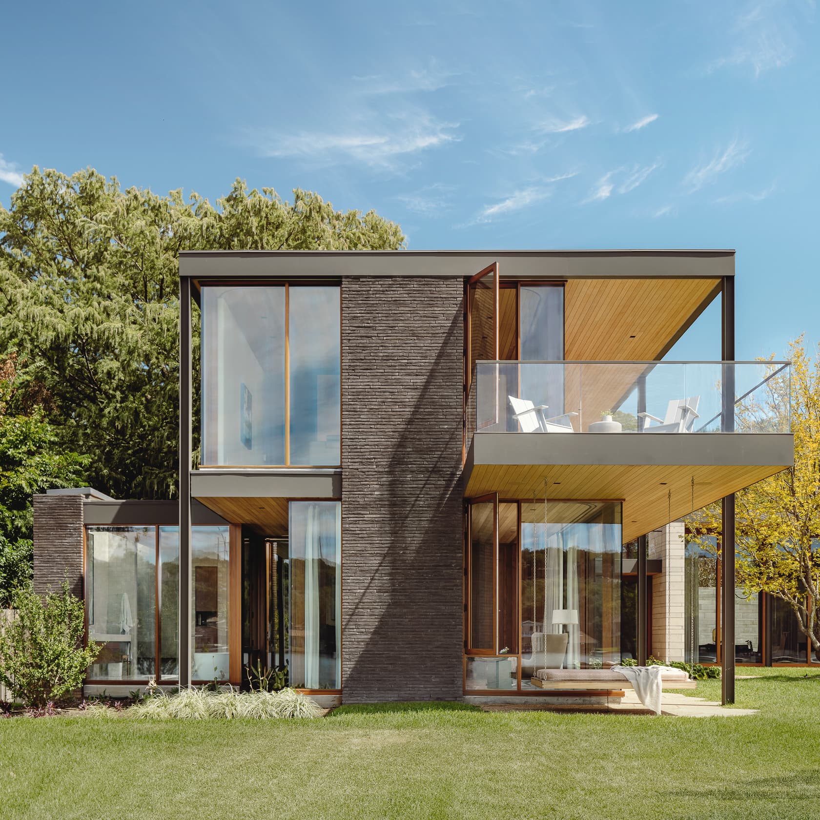 Water's Edge Residence - Looking into Primary suite from backyard; A Parallel Architecture